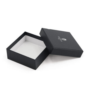 Caja de regalo para accesorios de piel rígida con textura y logotipo en lámina